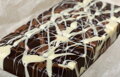 Tabuľková čokoláda ART (600g) horká s hrozienkami a arašidami